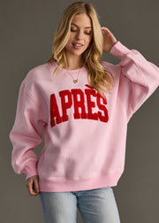 light pink and red apres sweatshirt, apres sweatshirt, light pink sweatshirt, oversized sweatshirt, women's sweatshirt, ski trip