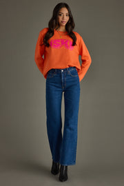 orange and bright pink ski goggles sweater, ski goggles sweater, ski sweater, colorful sweater, orange sweater, women's sweater, ski trip