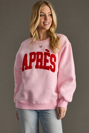light pink and red apres sweatshirt, apres sweatshirt, light pink sweatshirt, oversized sweatshirt, women's sweatshirt, ski trip