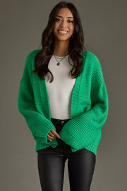 green knit ski cardigan, bright green cardigan, colorful cardigan, ski cardigan, women's cardigan, ski trip, ski vacation