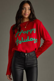 Woman wearing a red sweater with 'Happy Holidays' text on a gray background