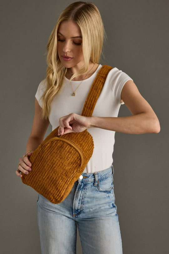 mustard corduroy sling bag