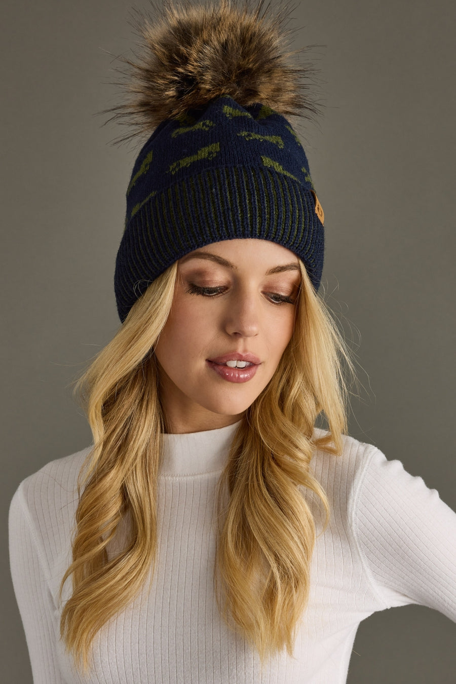 navy and green horse pattern pom hat, navy pom hat, women's pom hat, horse pattern, faux fur pom accent