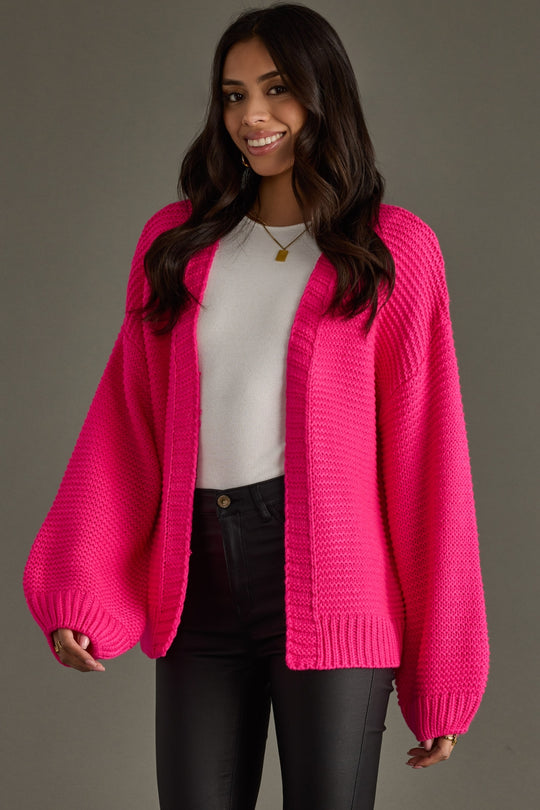 pink knit ski cardigan, ski cardigan, bright pink ski cardigan, winter cardigan, colorful cardigan, ski trip, ski vacation, women's cardigan