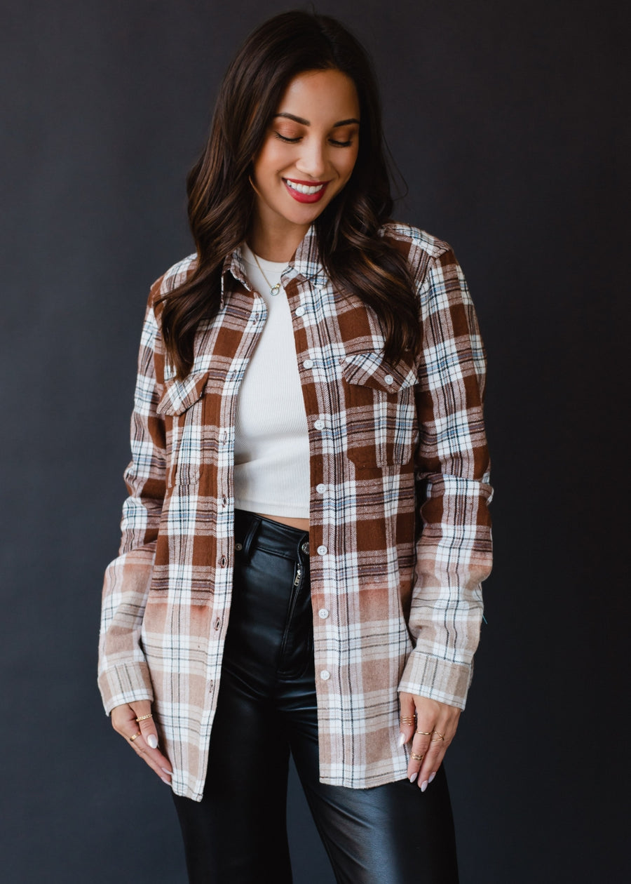 brown, black, blue and white plaid flannel