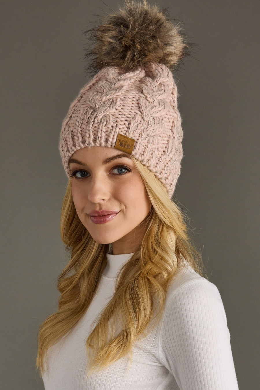 blush cable knit pom hat