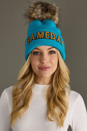 bright blue and tan game day pom hat, game day hat,  Honolulu blue, bright blue pom hat, winter hat, women's pom hat
