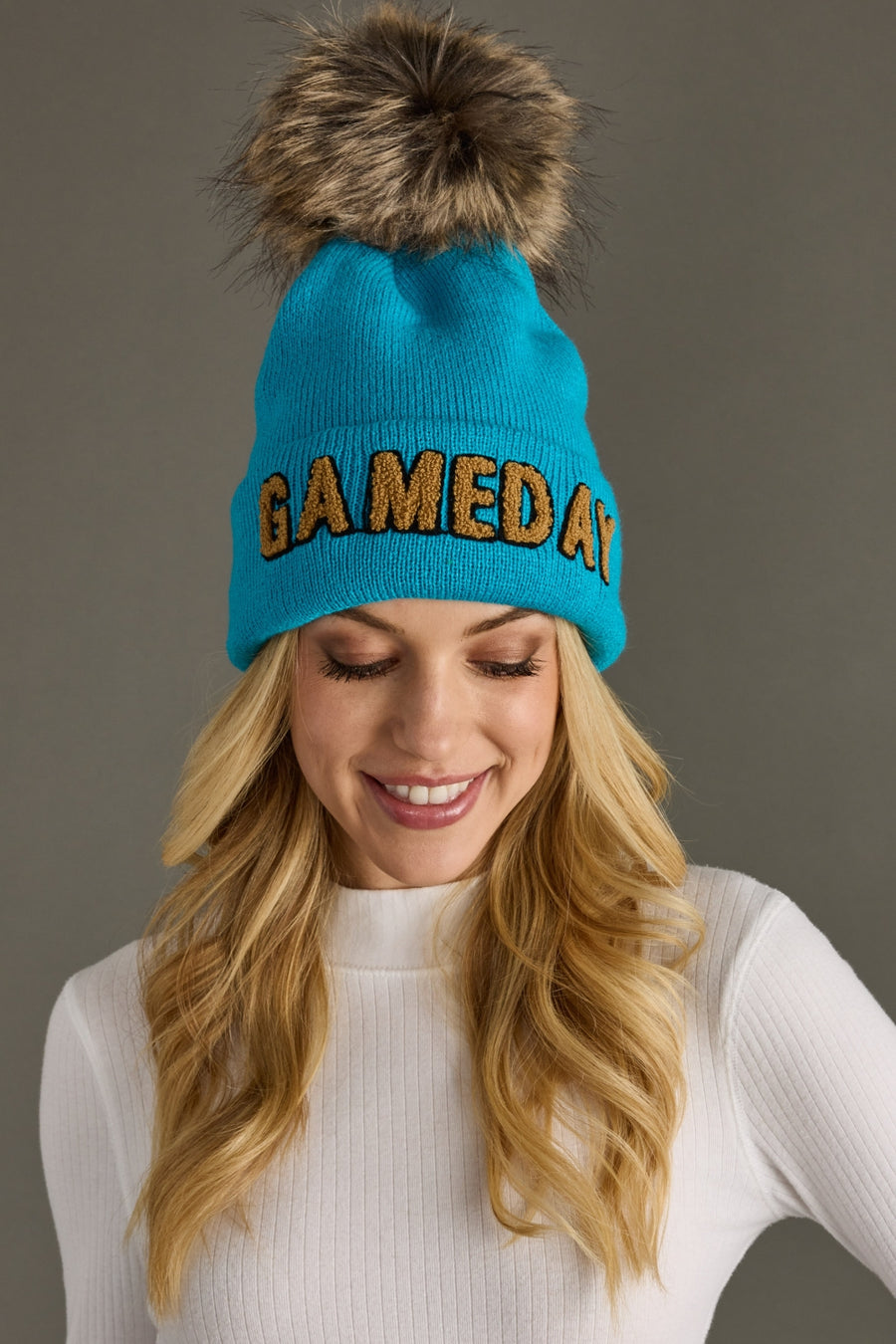 bright blue and tan game day pom hat, game day hat,  Honolulu blue, bright blue pom hat, winter hat, women's pom hat