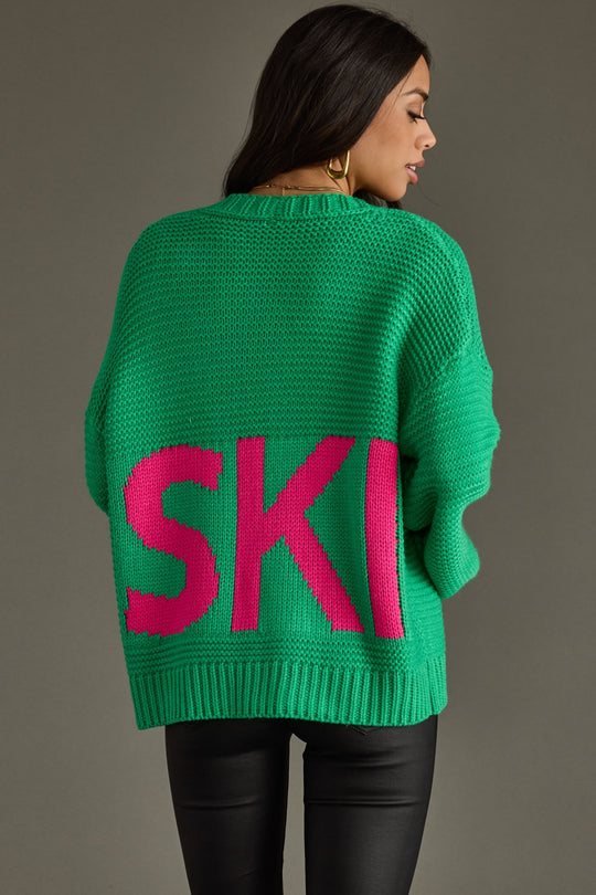 green knit ski cardigan, bright green cardigan, colorful cardigan, ski cardigan, women's cardigan, ski trip, ski vacation