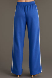 Blue Lounge Sweatpants featuring a wide-leg design with a white side stripe and an elastic waist.