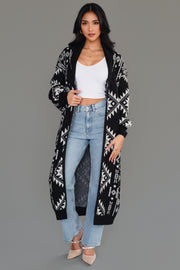 Front studio view of Panache Apparel’s long black and white Western cardigan with an open front and patterned knit design.
