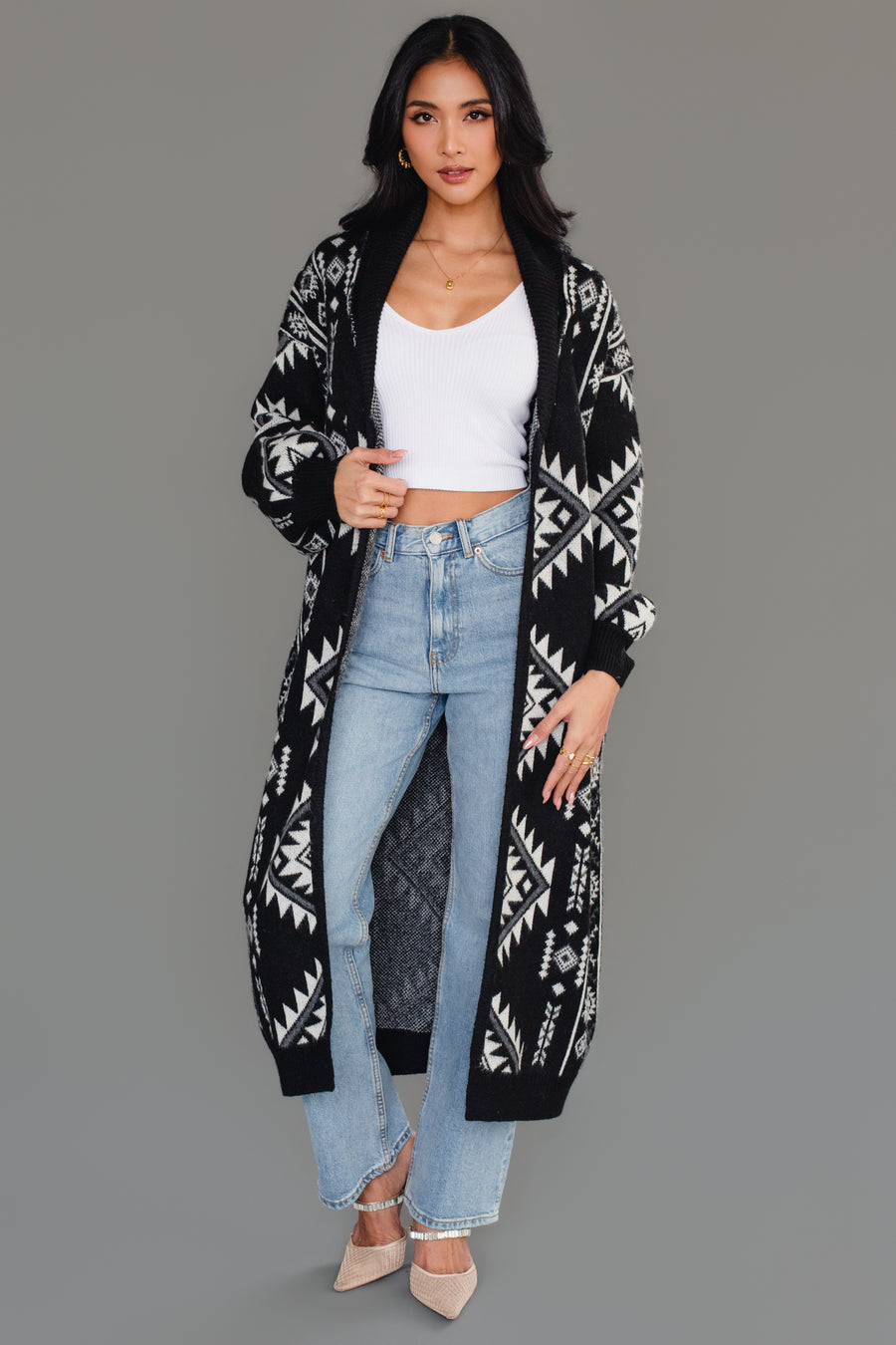 Front studio view of Panache Apparel’s long black and white Western cardigan with an open front and patterned knit design.