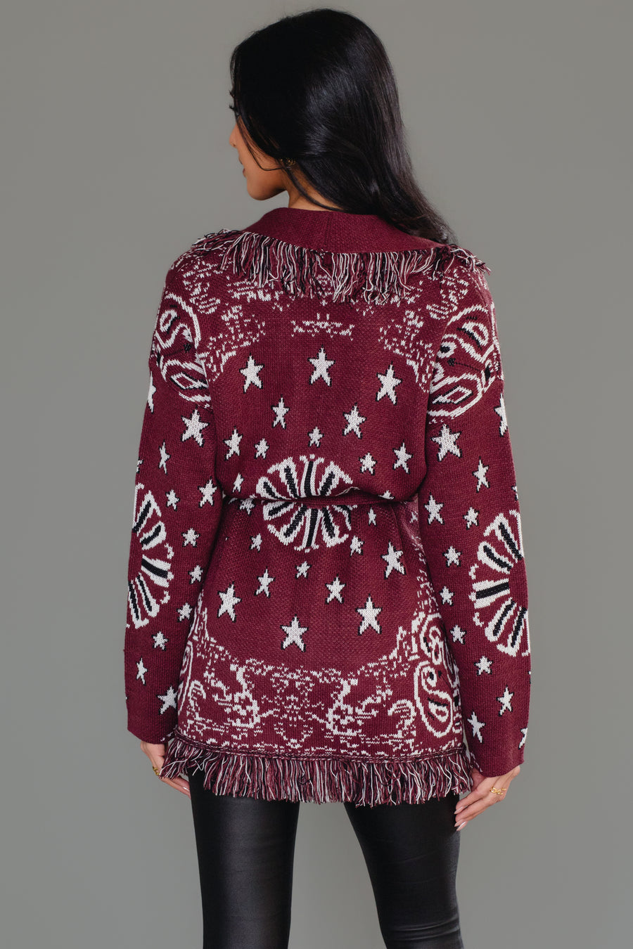 Back view of Panache Apparel’s burgundy bandana fringe cardigan showing the bandana print and fringe detail.