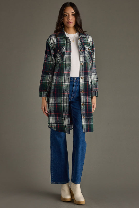 Full-length front view of woman wearing Panache Apparel’s Manchester Plaid Long Flannel with button-front closure and chest pockets.