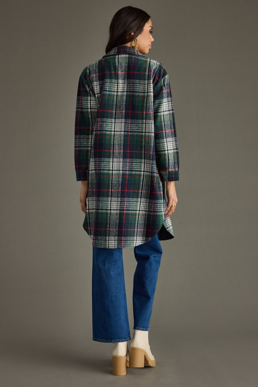 Back view of Panache Apparel’s Manchester Plaid Long Flannel showing the long plaid silhouette and curved hem.