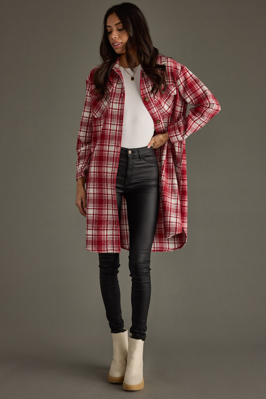 Front view of the red and white plaid Winston Long Flannel featuring long sleeves and chest pockets.