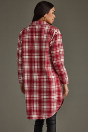 Back view of Winston Plaid Long Flannel showing the red and ivory plaid pattern, long sleeves, and curved hem.