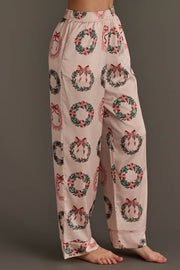Christmas Wreaths Satin Pajama Set in light pink, featuring an all-over print of green Christmas wreaths with red bows.