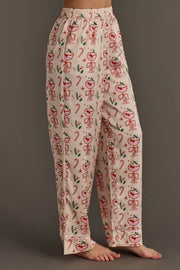 Ivory Christmas Cocktails Satin Pajama Set featuring ivory pajama pants with a festive cocktail print of candy canes and holly leaves, perfect for holiday lounging.