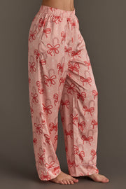 Light pink Candy Canes & Bows Satin Pajama Set pants featuring a red candy cane print and bows, perfect for holiday loungewear.