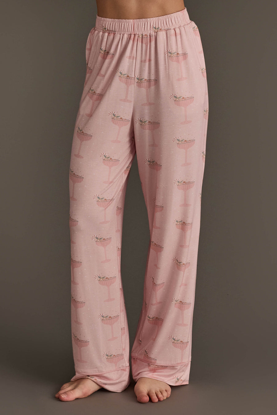 Pale pink Christmas Cocktails Jersey Pajama Set pants featuring an all-over print of festive cocktails.
