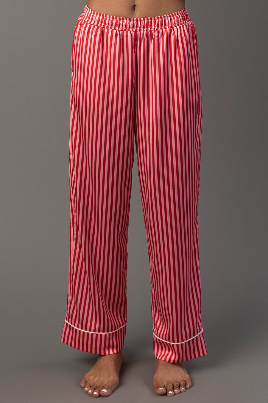Panache Apparel Collection Red & Pink Striped Satin Pajama Set pajama pants featuring red and pink vertical stripes with white hem piping.