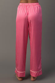 Back view of Bright Pink & Light Pink Striped Satin Pajama Set pants in bright and light pink vertical stripes with white piped cuffs.