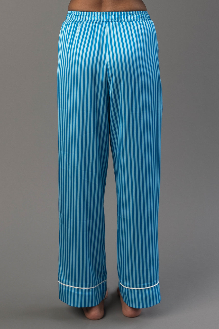Blue & Light Blue Striped Satin Pajama Set pants featuring blue and light blue stripes, a satin finish, and a white hem at the ankles.