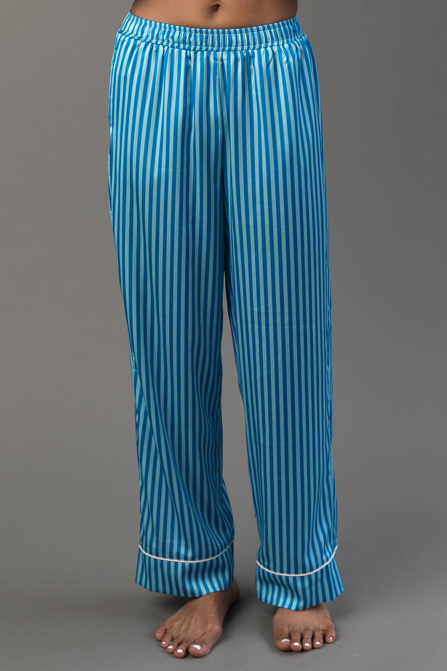 Blue & Light Blue Striped Satin Pajama Set pants in blue and light blue stripes with white piping at the cuffs.