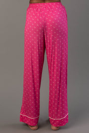 Pink & Light Pink Ho Ho Ho Jersey Pajama Set featuring hot pink jersey pajama pants with a repeating ho ho ho print and white piping at the cuffs.