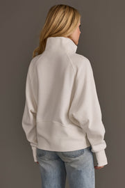 Back view of Panache Apparel’s white women’s quarter zip sweatshirt.