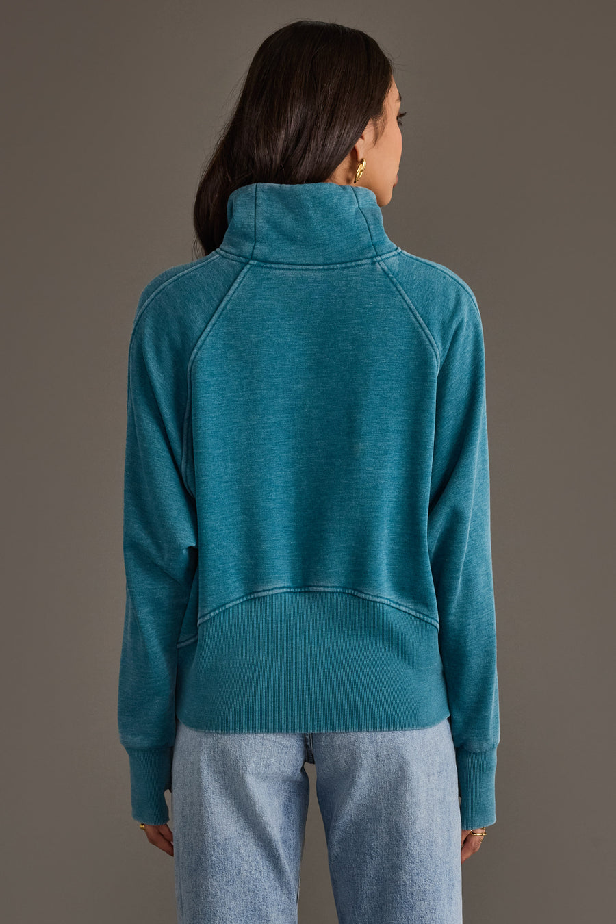 Back view of Panache Apparel’s dark teal women’s quarter zip sweatshirt.