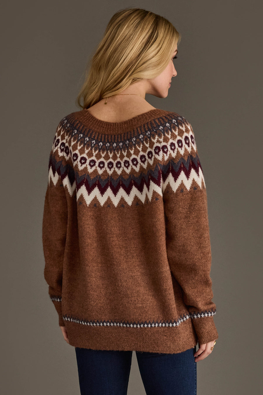 Back view of Panache Apparel’s brown Fair Isle sweater showing the patterned shoulders, ribbed cuffs and relaxed fit.