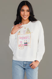 A person wearing a white Merry Bar Cart Sweatshirt by Panache Apparel Collection featuring a graphic illustration of a bar cart decorated for the holidays with the word MERRY in pink letters.
