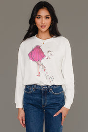 Fancy Christmas Fa La La Sweatshirt, a white crewneck featuring an illustration of a woman in a pink skirt and heels tangled in string lights with the words fa la la written above.