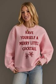 Panache Apparel Collection Pink Merry Little Cocktail Embroidered Sweatshirt in pink, featuring red embroidered text that reads Have yourself a merry little cocktail above two martini glasses.