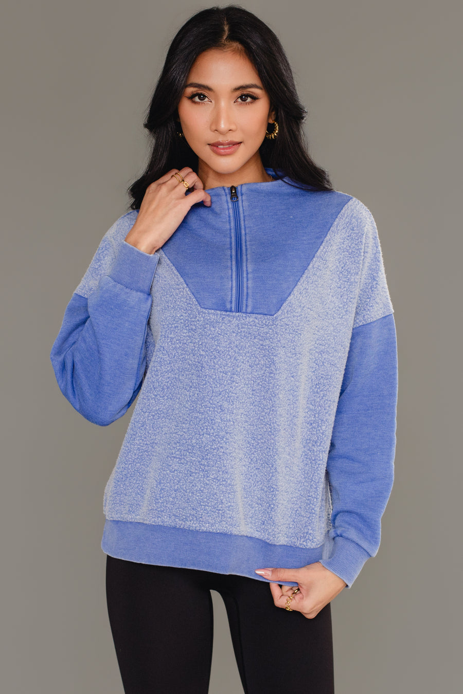 Front view of woman wearing Panache Apparel’s royal blue mixed media quarter zip sweatshirt.