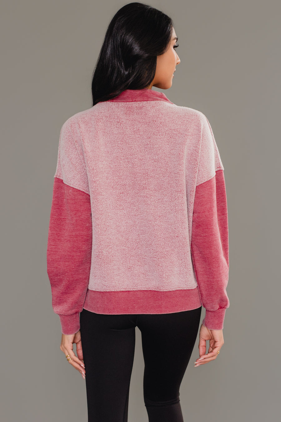 Back view of woman wearing Panache Apparel’s burgundy mixed media quarter zip sweatshirt.