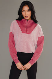 Woman wearing Panache Apparel’s burgundy mixed media quarter zip sweatshirt.