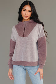 Front view of woman wearing Panache Apparel’s brown mixed media quarter zip sweatshirt.