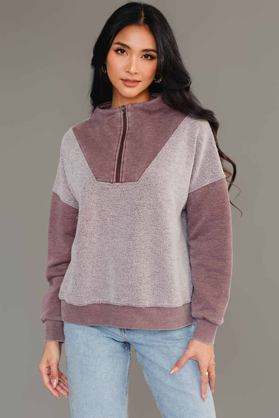Front view of woman wearing Panache Apparel’s brown mixed media quarter zip sweatshirt.