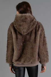 A person with long brown hair, seen from behind, is wearing the Panache Apparel Collection Gray/Brown Faux Fur Hooded Sweatshirt and black leather pants against a plain gray background.
