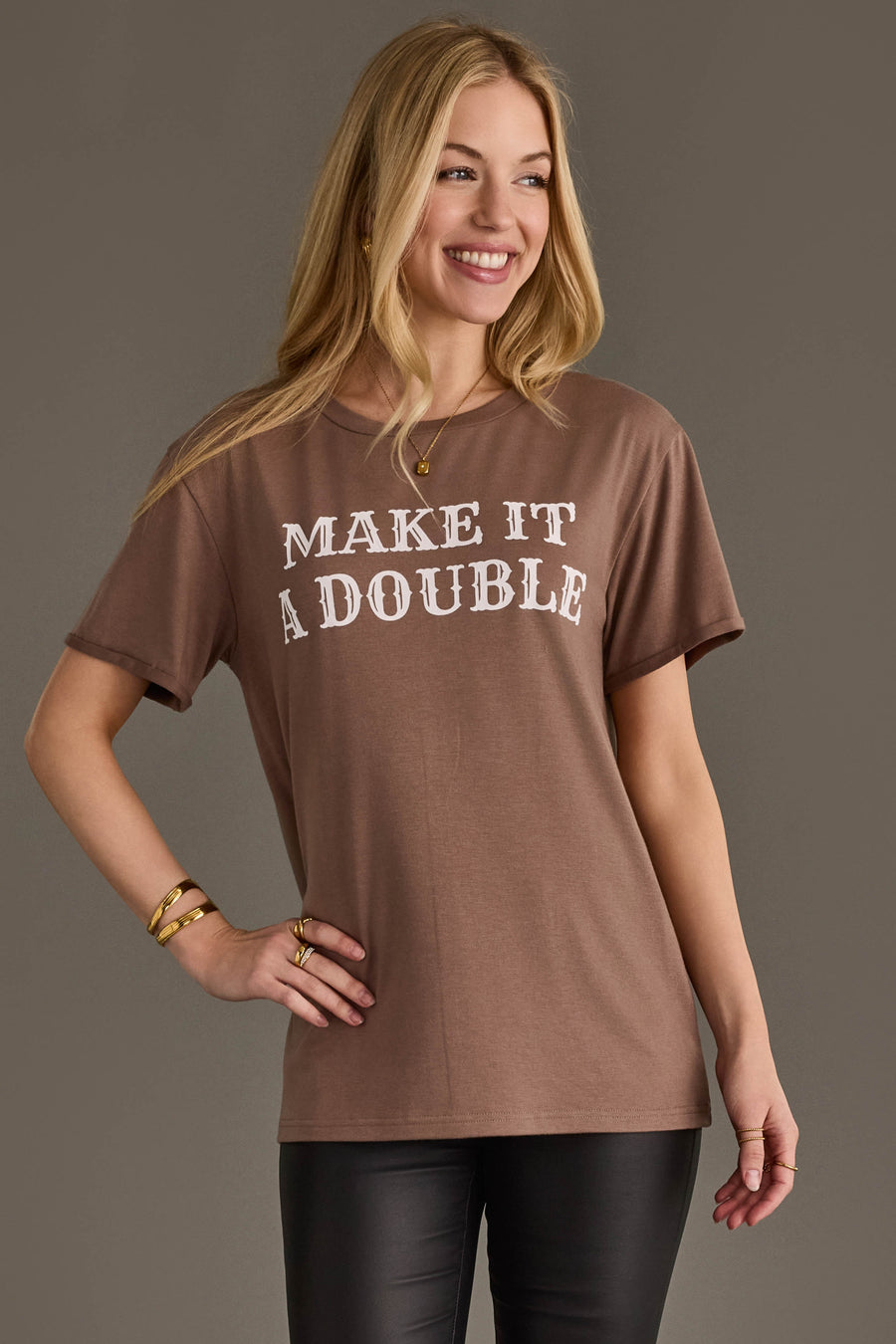 Woman wearing Panache Apparel’s brown Make It A Double western graphic tee.
