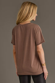 Back view of woman wearing Panache Apparel’s brown Make It A Double western graphic tee.