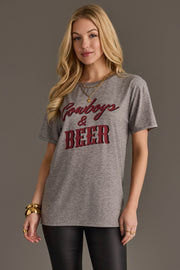 Woman wearing Panache Apparel’s gray Cowboys & Beer western graphic tee.