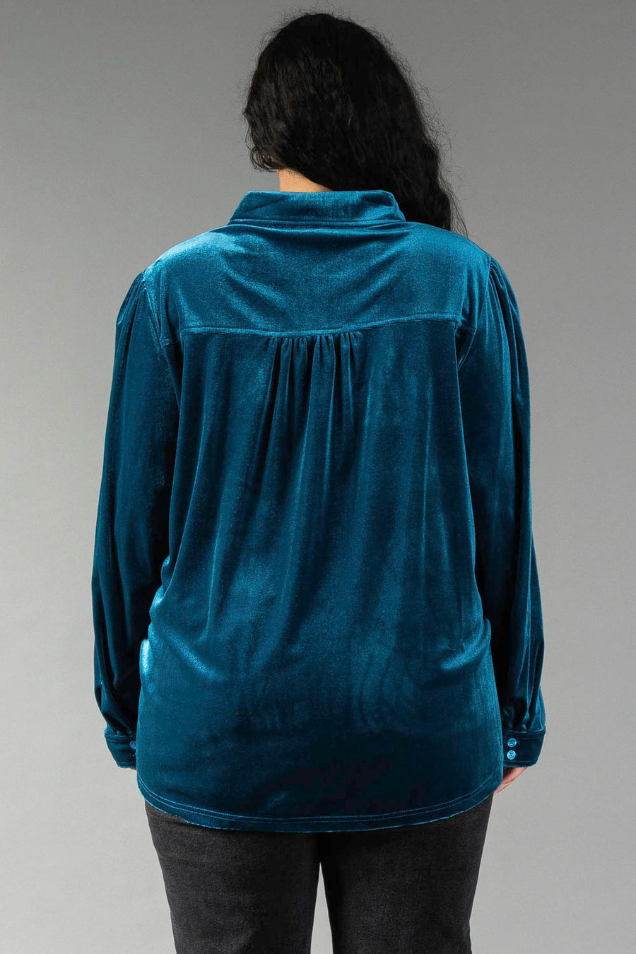 Back view of a Dark Teal Velvet Button Up shirt, featuring a relaxed fit and a pleated back yoke.