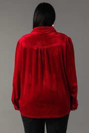 Back view of a person wearing a long-sleeved red velvet button-up blouse from the Panache Apparel Collection Red Velvet Button Up.