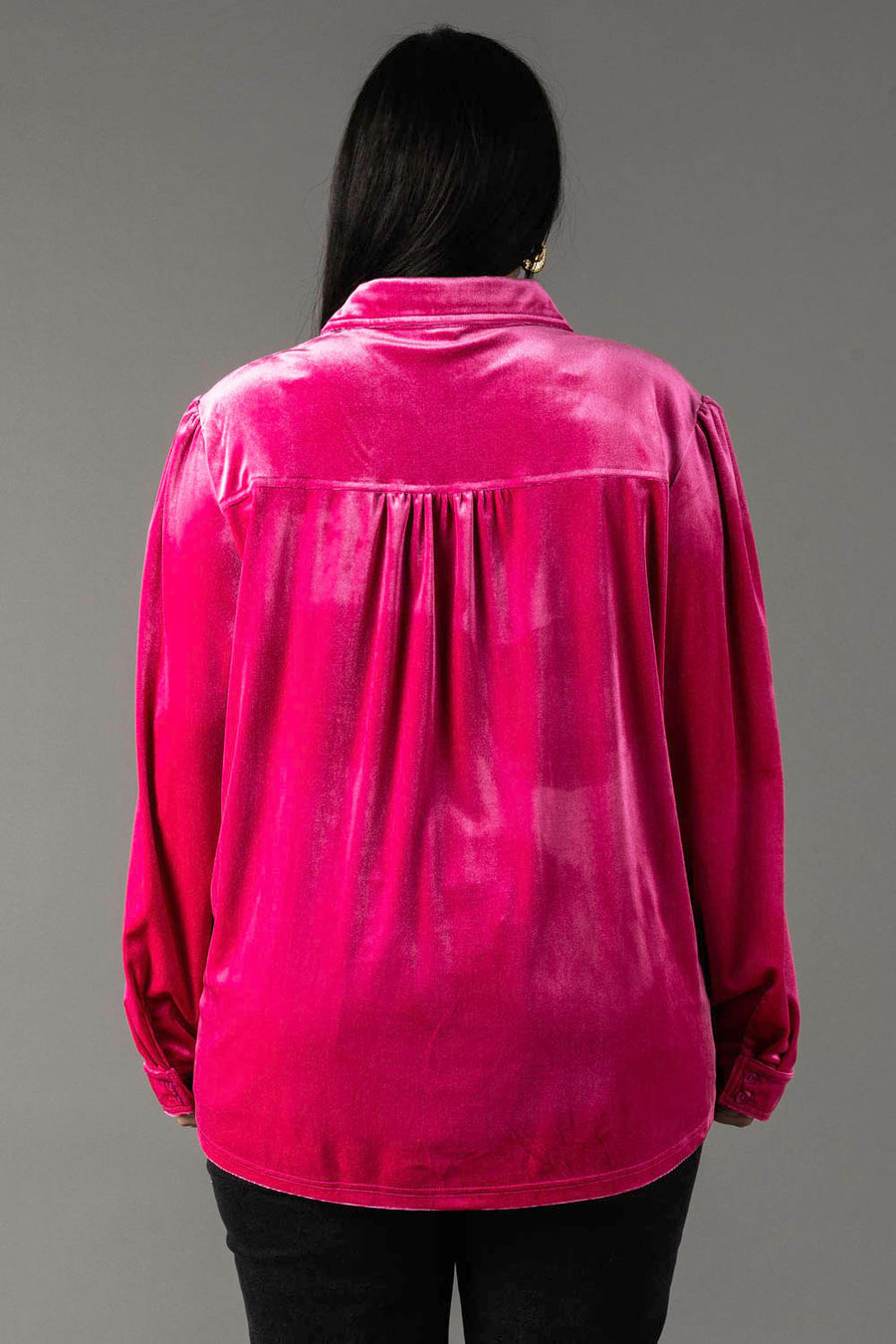 Back view of a Bright Pink Velvet Button Up in soft velvet, featuring a pleated back yoke.