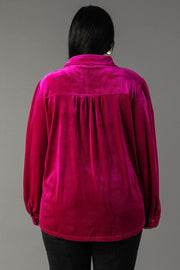 Back view of the Fuchsia Velvet Button Up in fuchsia velvet, featuring a pleated back yoke.