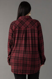 A person with long dark hair is seen from behind, wearing the Panache Apparel Collection Maroon & Black Plaid Button Up against a plain gray background.